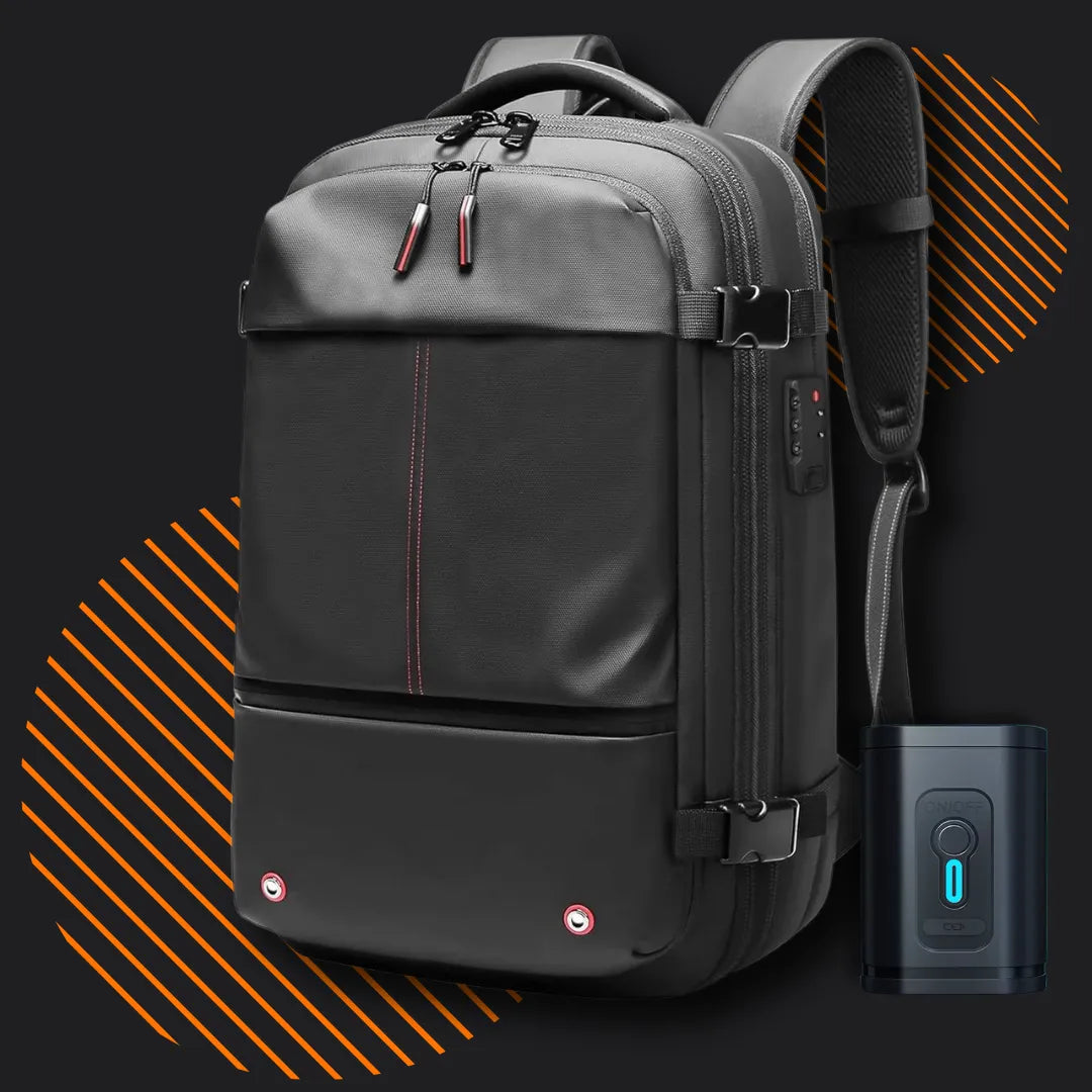 Sleek black backpack with red accents, USB charging port, and anti-theft lock on a dark background.